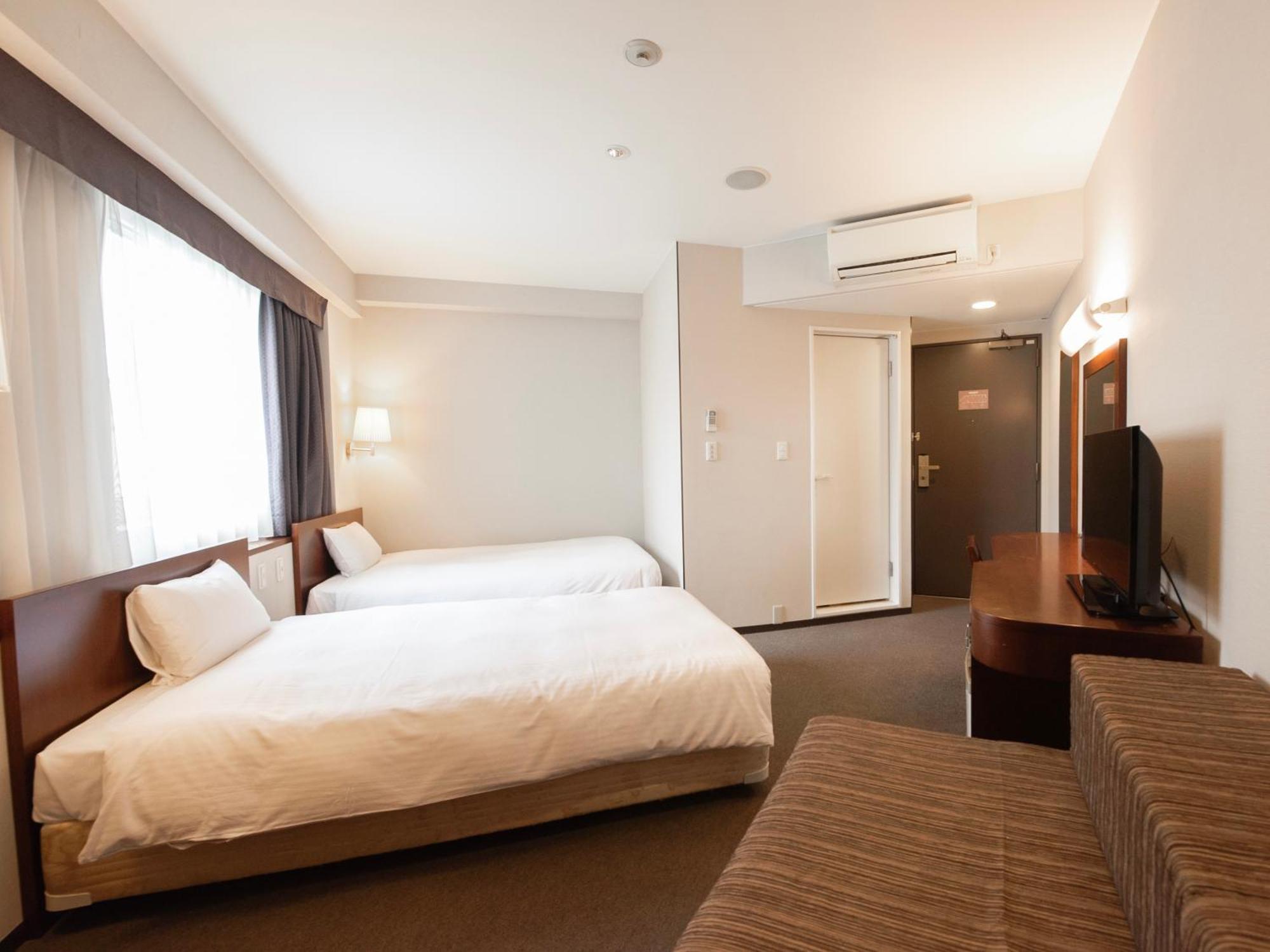 Hotel Hillarys Osaka Quarto foto